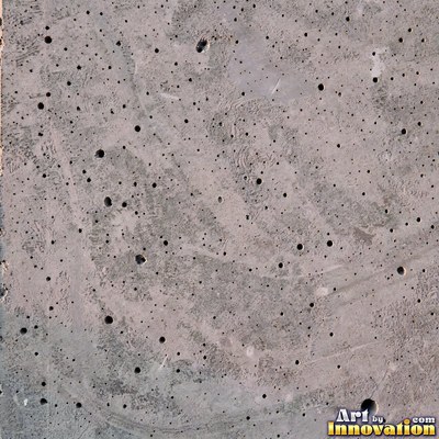 Gray concrete slab with a fine hairline crack running across it