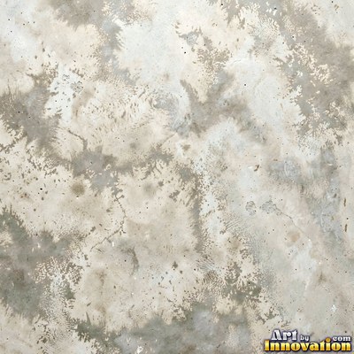 Smooth raw concrete with small air holes scattered across the surface