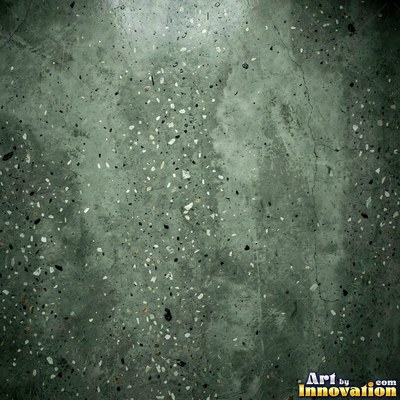 Smooth raw concrete with small air holes scattered across the surface