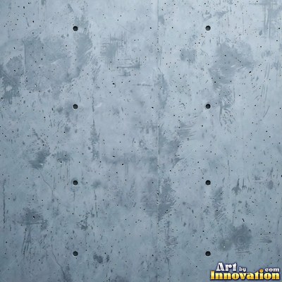Smooth raw concrete with small air holes scattered across the surface
