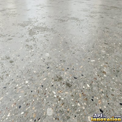 Acid washed concrete with mottled light and dark gray staining