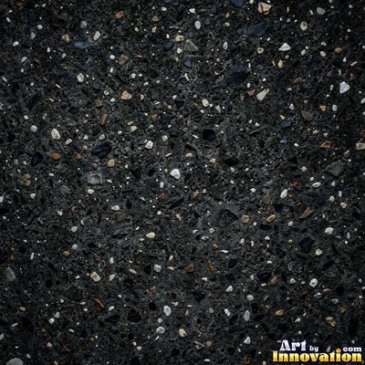 Smooth raw concrete with small air holes scattered across the surface