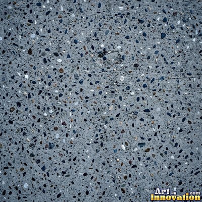 Poured concrete in pale off-white with soft cloudy color variation