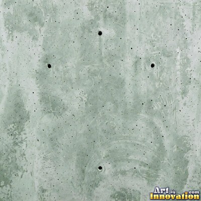 Smooth raw concrete with small air holes scattered across the surface