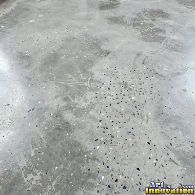 Poured concrete in pale off-white with soft cloudy color variation