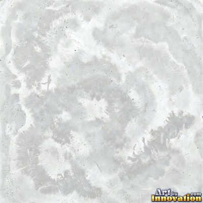 Smooth raw concrete with small air holes scattered across the surface