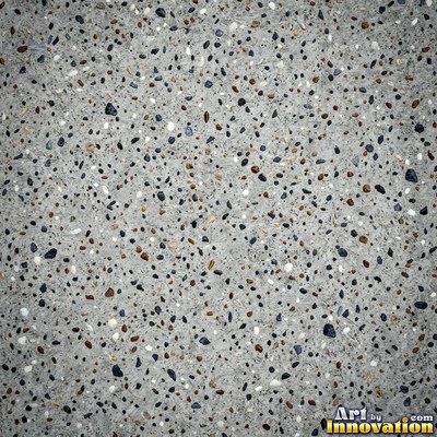 Smooth raw concrete with small air holes scattered across the surface