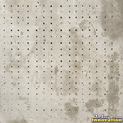 Smooth raw concrete with small air holes scattered across the surface