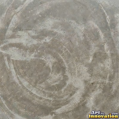 Poured concrete in pale off-white with soft cloudy color variation