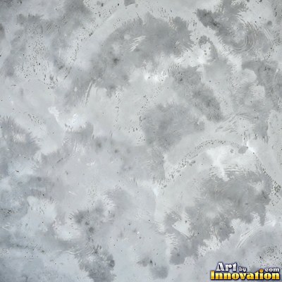 Acid washed concrete with mottled light and dark gray staining