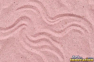 White coral sand dune surface with soft shadowed ridges