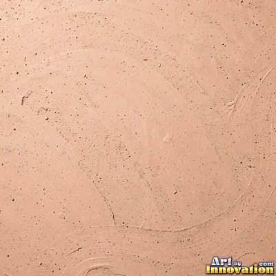 Gravelly copper orange soil scattered with small stones