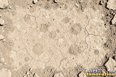 Gravelly copper orange soil scattered with small stones