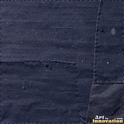 Stonewashed denim with mottled color in soft ivory tones