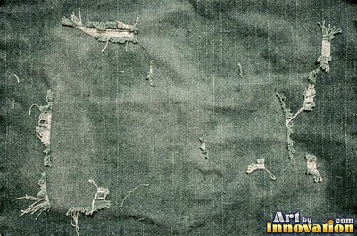 Stonewashed denim with mottled color in soft ivory tones