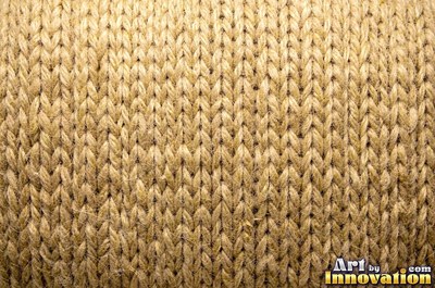 Basket weave knit stitch pattern in teal yarn