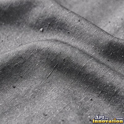 Ivory raw silk showing small slubs in the weave
