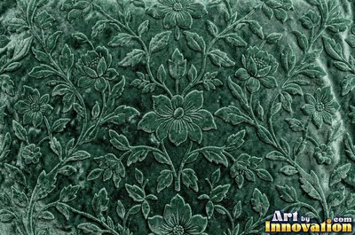 Emerald green velvet embossed with a raised floral pattern