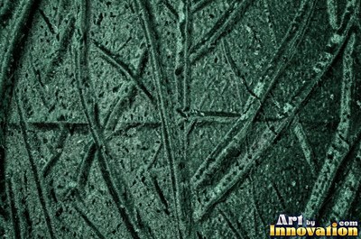 Emerald green velvet embossed with a raised floral pattern