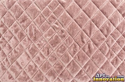 Emerald green velvet embossed with a raised floral pattern