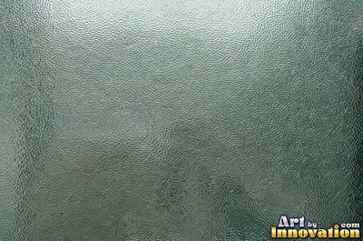 Patterned glass with a floral relief in smoky gray