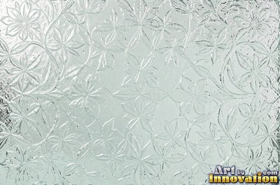 Patterned glass with a floral relief in smoky gray