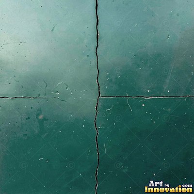 Cracked glass with light catching the fracture edges