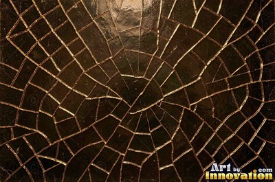 Laminated glass with a web of cracks held together, faint blue tint