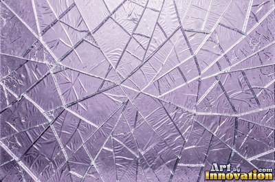 Laminated glass with a web of cracks held together, faint blue tint