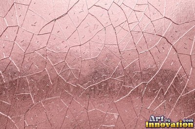 Cracked glass with light catching the fracture edges