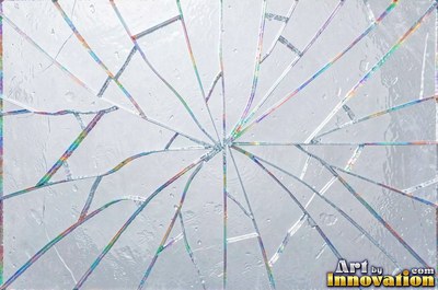 Smoky gray cracked glass laid over a dark background