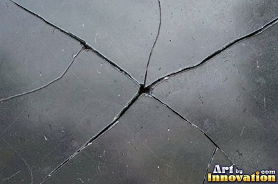 Shattered glass with a spider web of cracks in violet tones