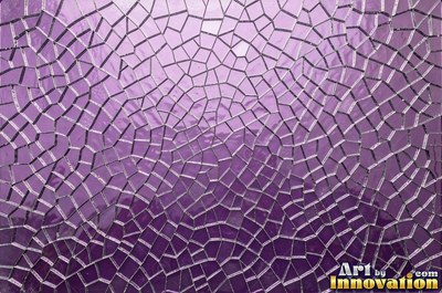 Cracked glass with light catching the fracture edges