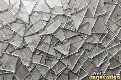 Shattered glass with a spider web of cracks in violet tones