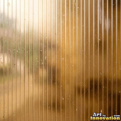 Frosted glass with clear patterned stripes in sea green