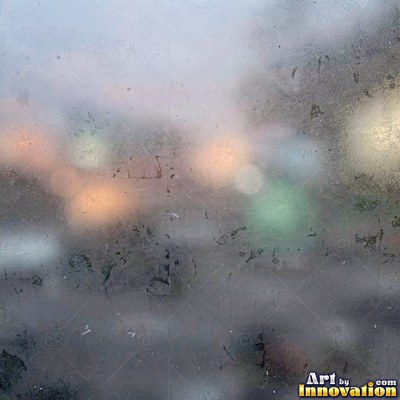Frosted glass with blurred colored light glowing through