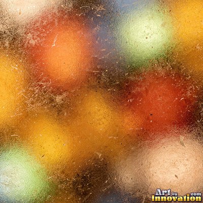 Frosted glass with soft emerald bokeh lights behind it