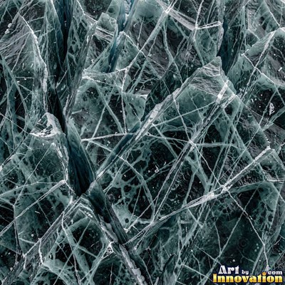 Clear ice full of trapped air bubbles in icy white blue