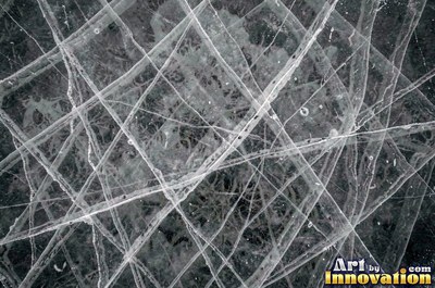 Frosted surface covered in fine crystal needles of pale aqua