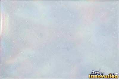 Frosted iridescent glass with soft cobalt color shifts