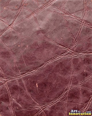 Old cracked leather with a crazed surface in whiskey brown