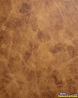 Old cracked leather with a crazed surface in whiskey brown