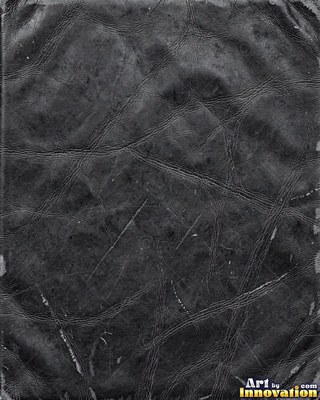 Worn saddle tan leather scuffed pale along the creases