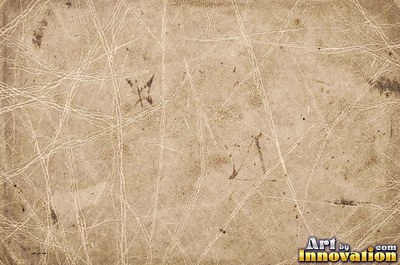 Old cracked leather with a crazed surface in whiskey brown