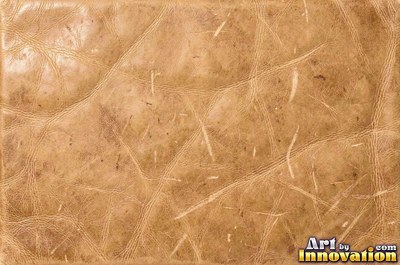 Old cracked leather with a crazed surface in whiskey brown