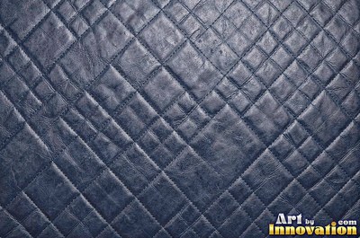 Crocodile embossed leather with large square scales in forest green