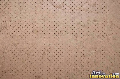 Embossed cognac leather with a fine pebble grain