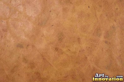 Smooth saddle tan leather panels joined at a seam