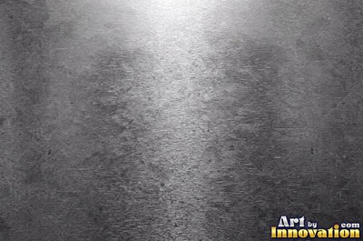 Coarse brushed finish with deep grain lines in dark gunmetal
