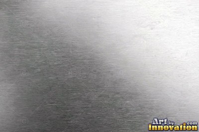 Coarse brushed finish with deep grain lines in dark gunmetal